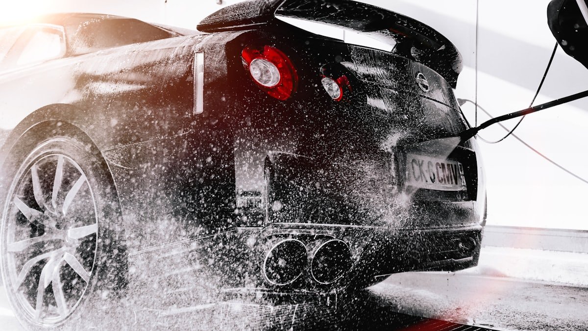 Car being rinsed during a full detail